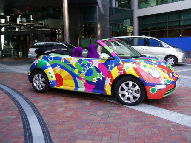 Austin Powers' psychedelic Union Jack VW Beetle parked outside a hotel
