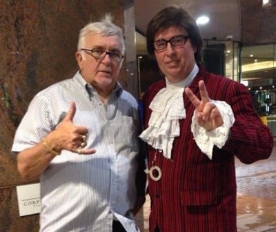 Gary Brown standing beside himself in character as Austin Powers