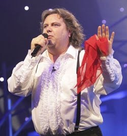 Meat Loaf tribute artist in a ruffled shirt